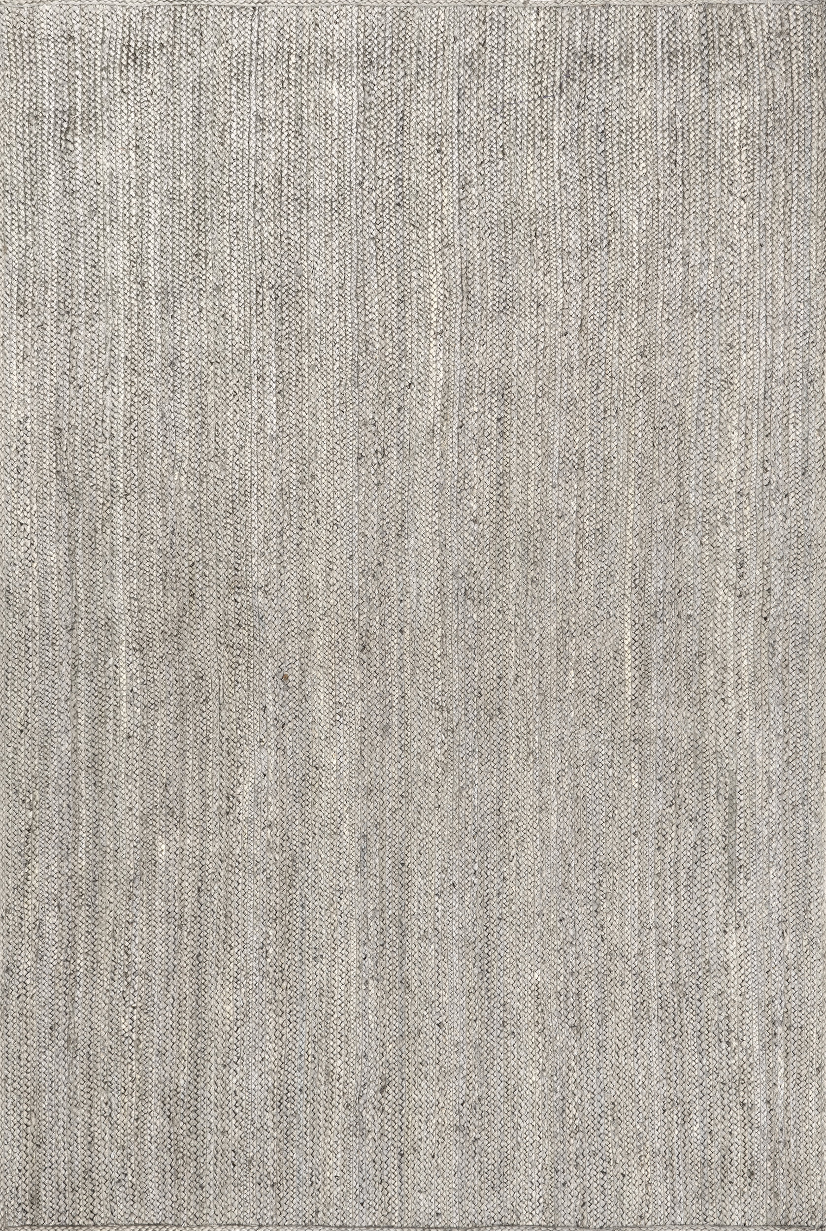 7fe8690a5af554767e6f43f3adb8910e3c95dc81 Isolated view of Grey Rectangle Jute Braided Rug, showcasing its design