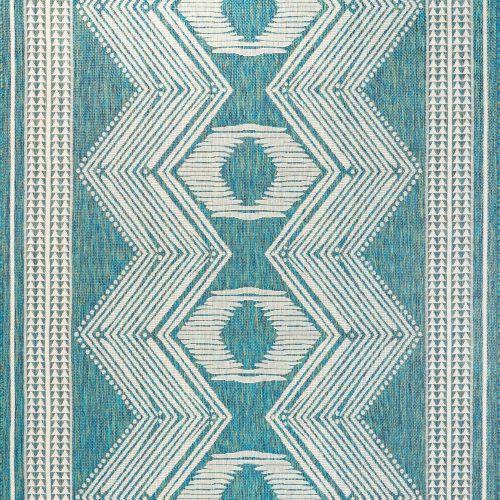Isolated view of Teal Rectangle Iris Totem Indoor/Outdoor Flatweave Rug, showcasing its design